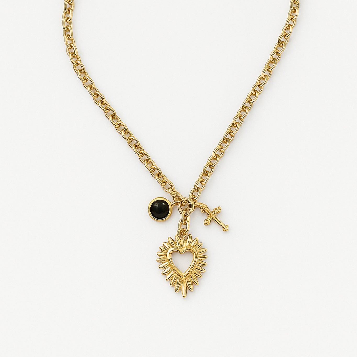 Colgante Corazón mas cruz mas charm acero oro de Bendita Eva