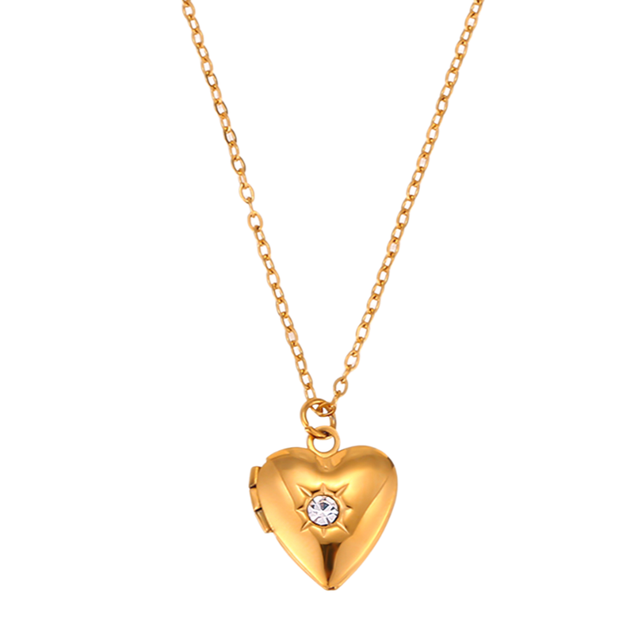 Este colgante corazón portafoto de 16 x 13 mm es un amuleto cargado de significado, diseñado para guardar recuerdos y emociones cerca del corazón de Bendita Eva