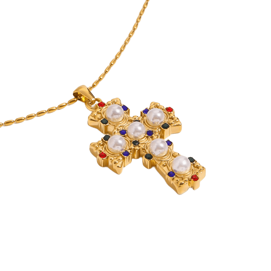 Colgante cruz XL con perlas y circonitas multicolor de Bendita Eva, detalle del diseño chunky en acero bañado en oro de 18K.