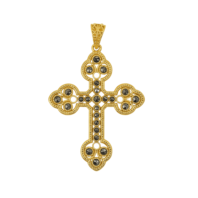 Nuestra cruz de filigrana con piedras naturales en oro destaca por su acabado detallado y su brillo sutil. Cada perla aporta un toque orgánico y único, creando una pieza refinada y femenina. Un accesorio versátil que aporta luz a cualquier look y se convierte en un talismán personal.