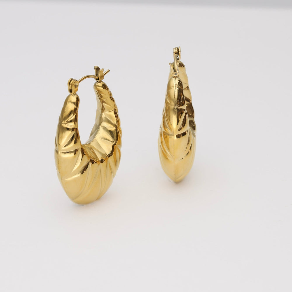 
                      
                        Pendientes oro Savanna
                      
                    