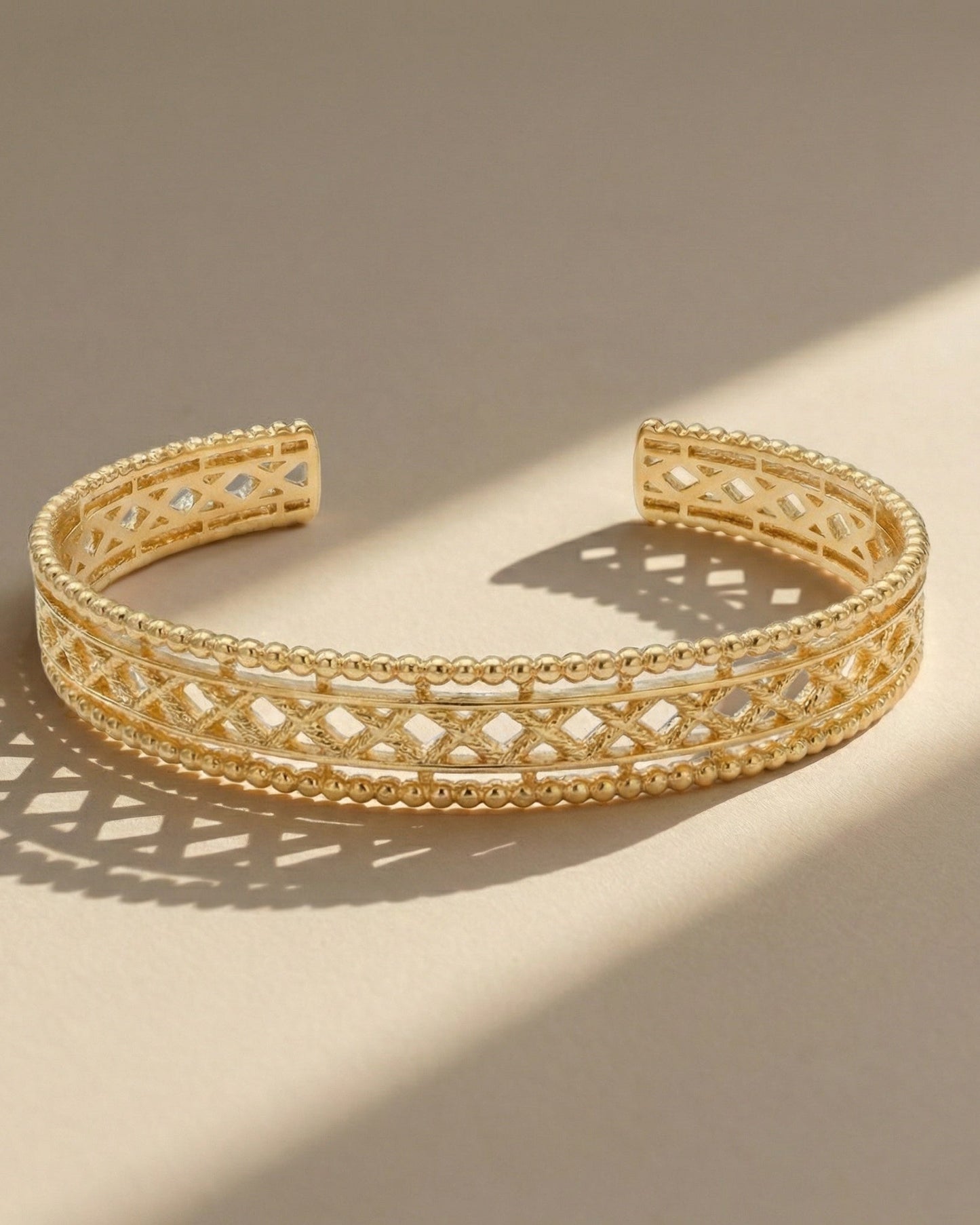 pulsera artesanal de filigrana, hecha a mano en España con plata de ley 925 y un delicado baño de oro 18K.